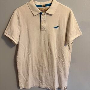 Hollister Men's Polo Shirt in Cream with Blue Logo